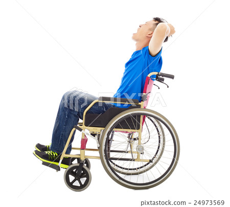 handicapped man sitting on a wheelchair  24973569