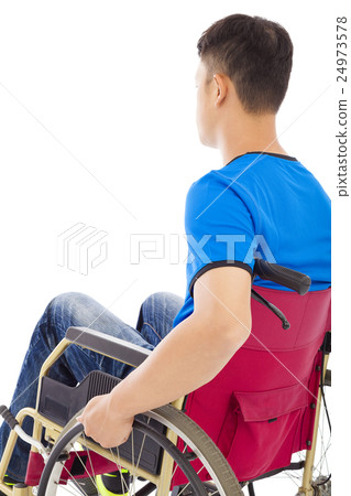 handicapped man sitting on a wheelchair  24973578