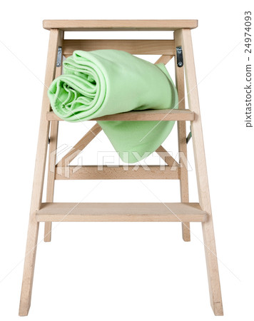 green blanket on a stepladder isolated on white green blanket on a stepladder isolated on white 24974093