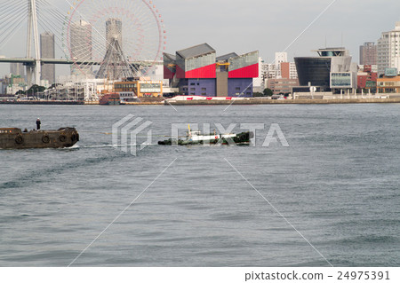 A boat that runs through the harbor and A boat that runs through the harbor and 24975391
