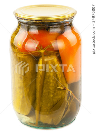 Pickled cucumbers in a glass jar Pickled cucumbers in a glass jar 24976807