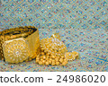 Golden jewelry on  elegance fabric 24986020