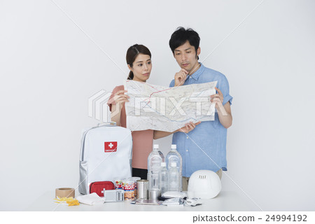 Stock Photo: disaster prevention, emergency supply, couple