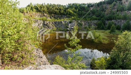 abandoned flooded quarry, Czech republic 24995503