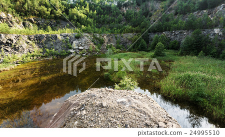 abandoned flooded quarry, Czech republic 24995510