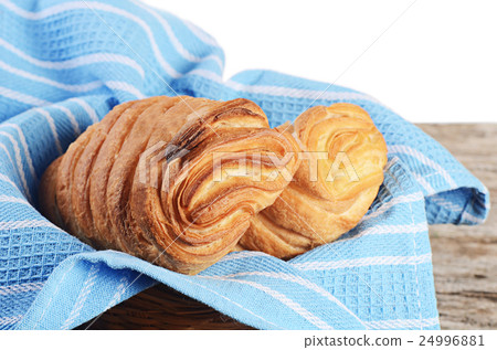 Heap of fresh rolls as background Heap of fresh rolls as background 24996881