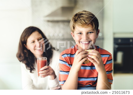 Mother Giving Food Son Concept Mother Giving Food Son Concept 25011673