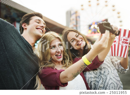 Amusement Park Friends Enjoyment Lifestyle Concept Amusement Park Friends Enjoyment Lifestyle Concept 25011955