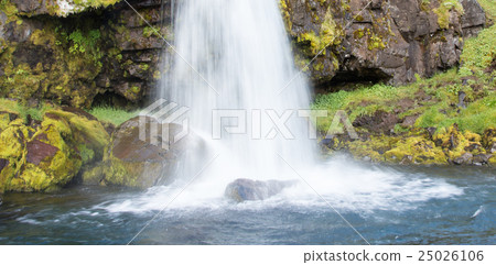 Kirkjufellsfoss waterfall near the mountain 25026106