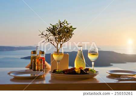 Dinner for two on a sunset background 25033261