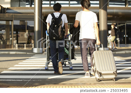 Men walking outside the airport Men walking outside the airport 25033495
