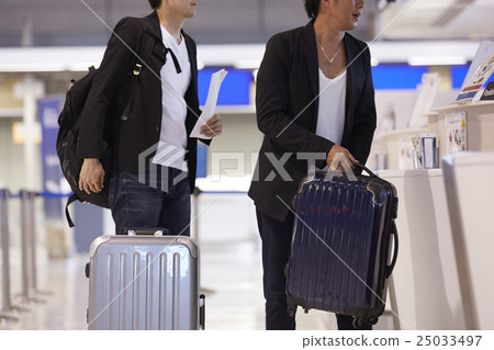 A man waiting for departure at the airport A man waiting for departure at the airport 25033497