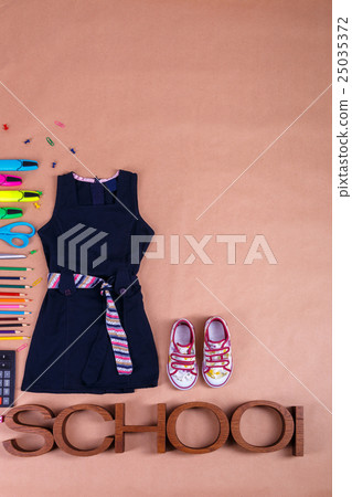 School uniform near sneakers and  supplies 25035372