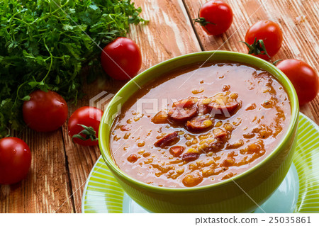Tomato soup with smoked sausage and tomatoes 25035861