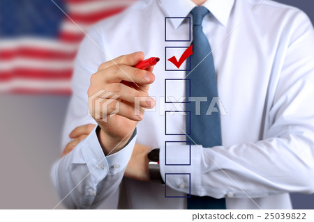 Businessman making vote by a red pen Businessman making vote by a red pen 25039822