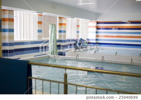 small indoor swimming pool empty, noone sport life 25040699