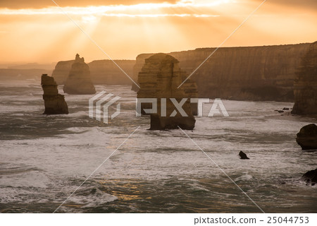 The sunset lightens the Australian Great Ocean Road's Twelve Apostles 25044753