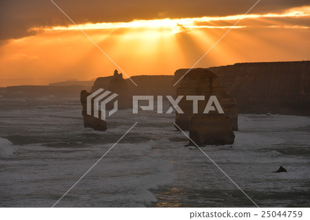 The sunset lightens the Australian Great Ocean Road's Twelve Apostles 25044759