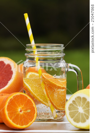fruit lemonade in jar 25047868