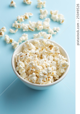 popcorn in bowl popcorn in bowl 25049526