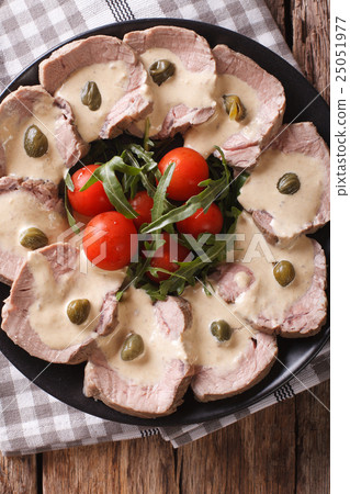 Vitello tonnato with capers close-up. Vertical Vitello tonnato with capers close-up. Vertical 25051977