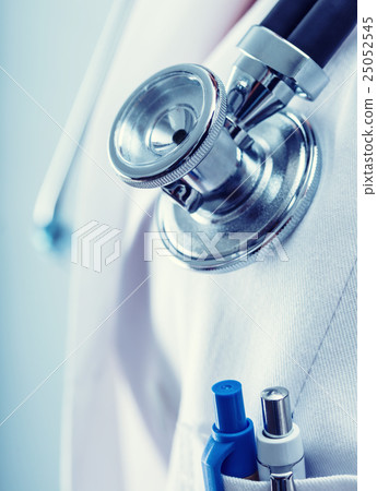 Doctor holding a stethoscope listening heartbeat Doctor holding a stethoscope listening heartbeat 25052545