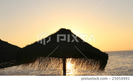 Beach lounge chair at lonely sandy beach., Spain  25058991