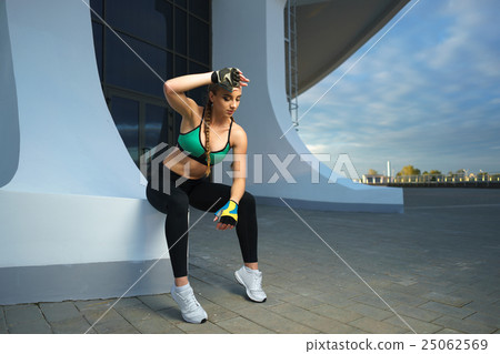fitness girl workout at modern urban area sunset 25062569
