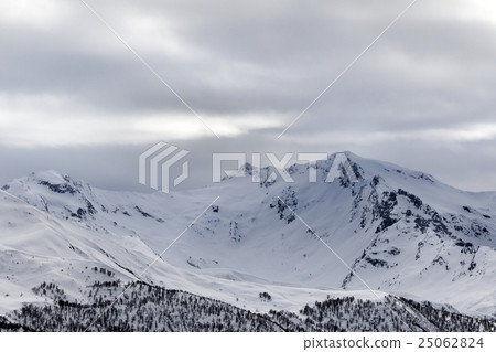 Snow mountain in fog at gray morning 25062824
