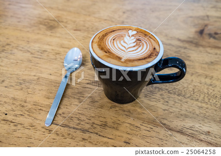 Coffee latte art wood background 25064258