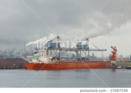 Unloading a huge ship Unloading a huge ship 25067246