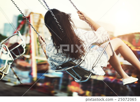 Woman Carnival Ride Riding Happiness Fun Concept Woman Carnival Ride Riding Happiness Fun Concept 25072065
