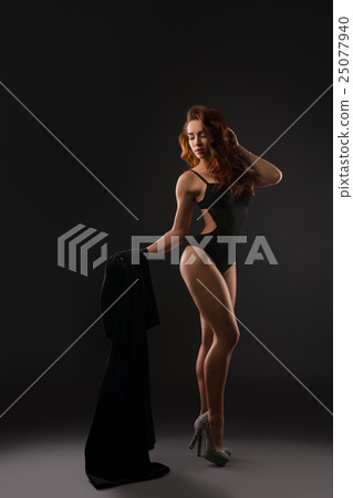 Sexy underwear model posing in high heels Sexy underwear model posing in high heels 25077940