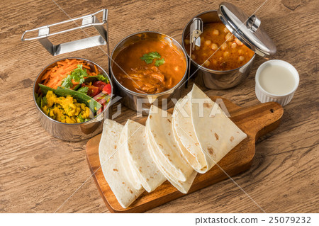 Indian curry meal chapati and curry lunch Indian curry meal chapati and curry lunch 25079232