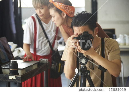 Photographer at shooting site Photographer at shooting site 25083039