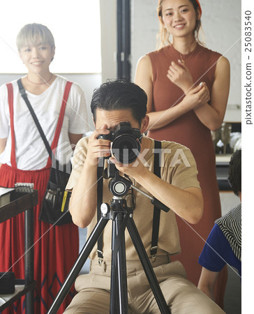 Photographer at shooting site Photographer at shooting site 25083540