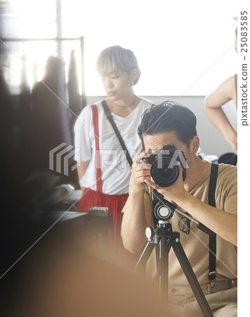 Photographer at shooting site Photographer at shooting site 25083585