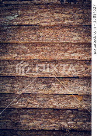 wooden wall made from wood logs with bark texture wooden wall made from wood logs with bark texture 25084527