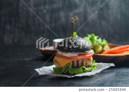 black burger with grilled chicken patty black burger with grilled chicken patty 25085846
