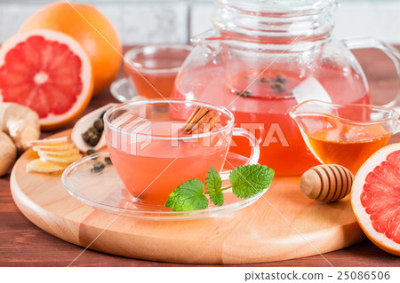 Grapefruit herbal tea with ginger and honey Grapefruit herbal tea with ginger and honey 25086506