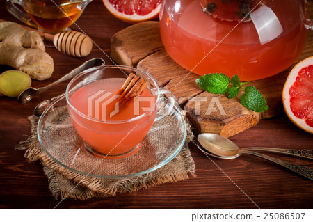 Grapefruit herbal tea with ginger and honey Grapefruit herbal tea with ginger and honey 25086507