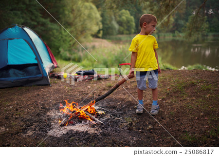 happy children hiking in the forest 25086817