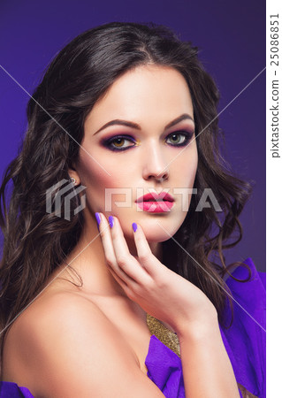 Brunette girl with purple make-up Brunette girl with purple make-up 25086851