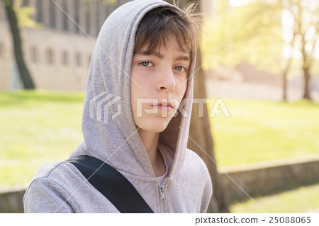 beautiful teenage boy with hoodie 25088065