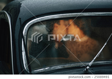 young and beautiful couple sitting in the  cortege 25089491