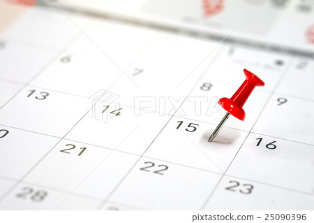 Embroidered red pins on a calendar Embroidered red pins on a calendar 25090396