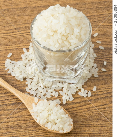 Japanese Rice in Wooden Spoon and Glass Cup Japanese Rice in Wooden Spoon and Glass Cup 25090884
