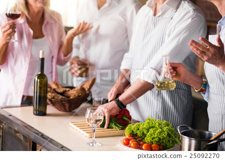Image of family cooking healthy food together Image of family cooking healthy food together 25092270