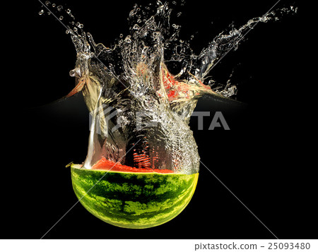 Fresh melon falling in water with splash on black 25093480