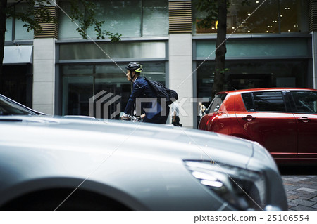 Businessman cycling 25106554